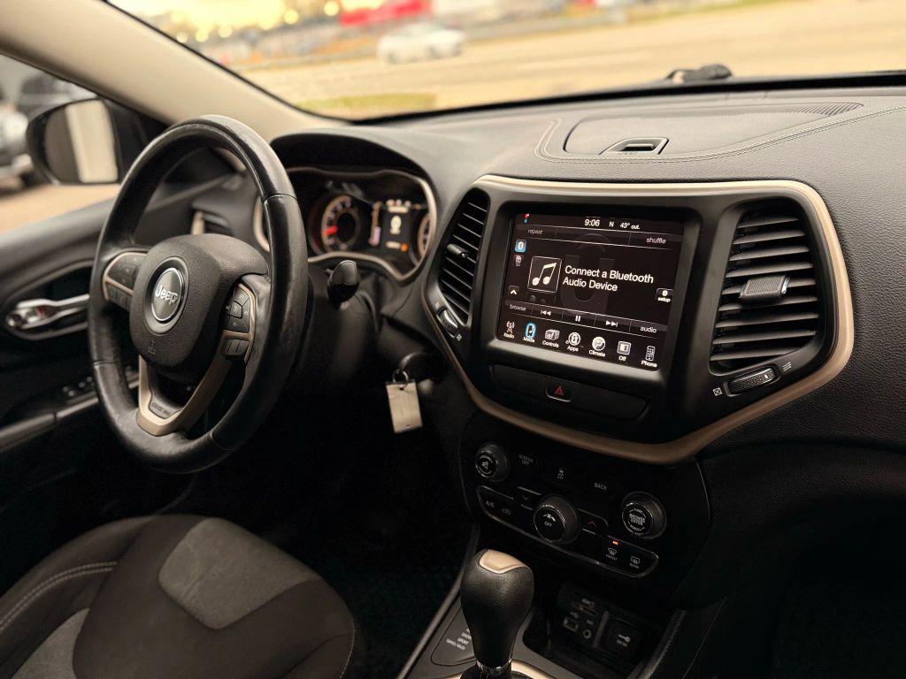 used 2014 Jeep Cherokee car, priced at $8,499