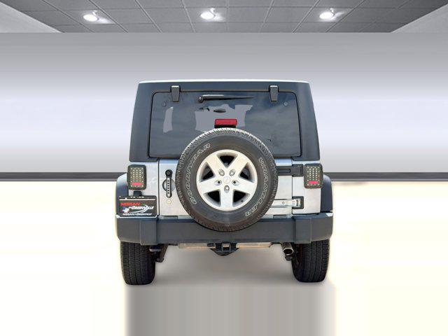 used 2018 Jeep Wrangler JK Unlimited car, priced at $19,499