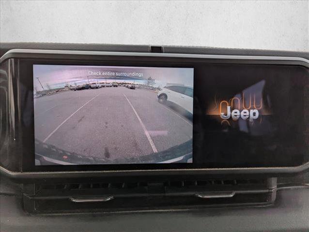 used 2024 Jeep Wrangler car, priced at $45,621