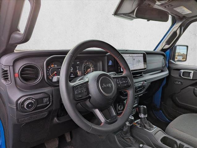 used 2024 Jeep Wrangler car, priced at $45,621