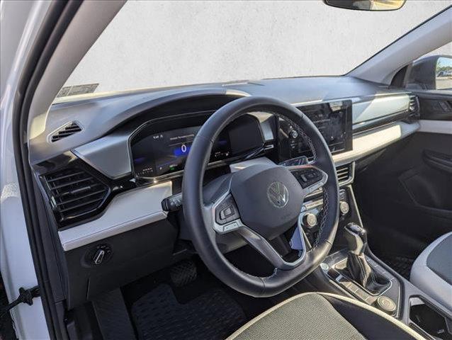 used 2025 Volkswagen Taos car, priced at $23,887