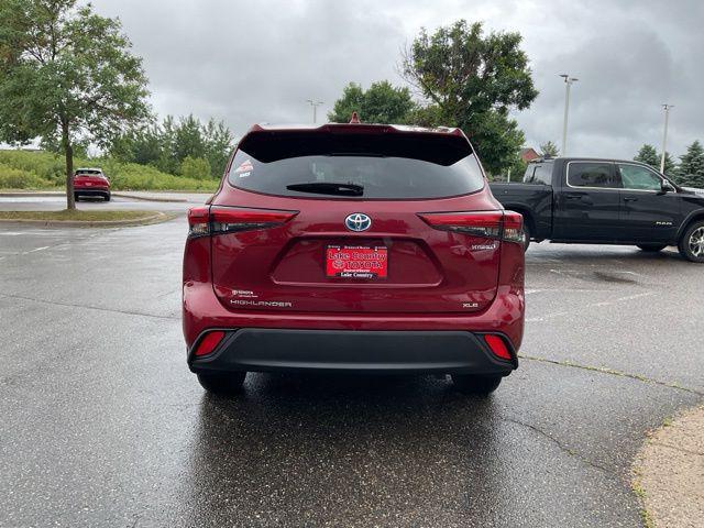 used 2022 Toyota Highlander Hybrid car, priced at $34,348