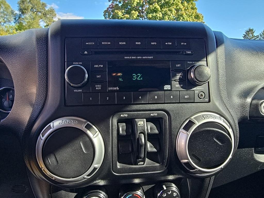 used 2012 Jeep Wrangler Unlimited car, priced at $12,500