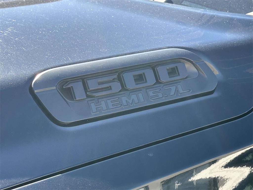 used 2019 Ram 1500 car, priced at $23,395