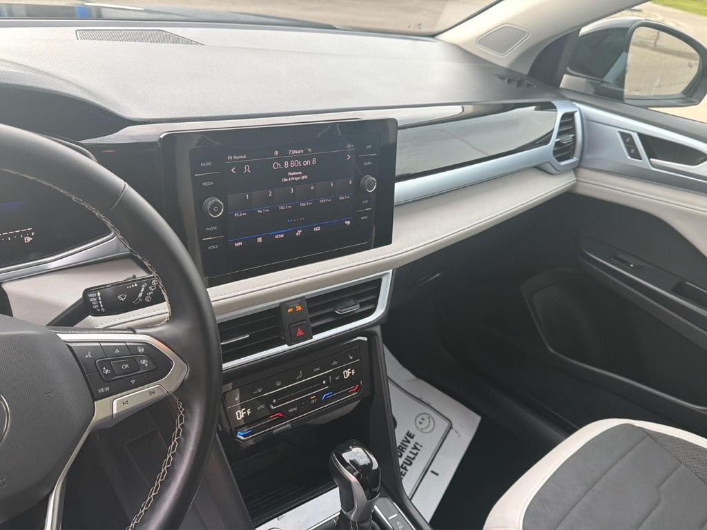 used 2025 Volkswagen Taos car, priced at $24,949