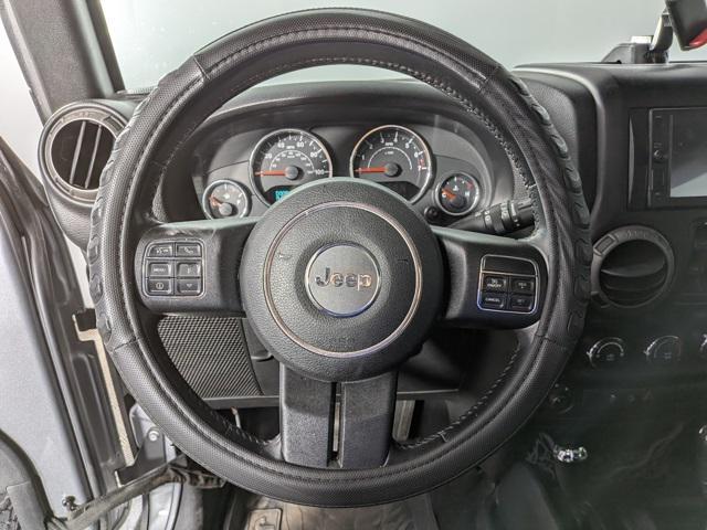 used 2015 Jeep Wrangler Unlimited car, priced at $10,093