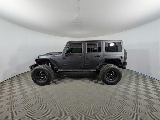 used 2015 Jeep Wrangler Unlimited car, priced at $9,192