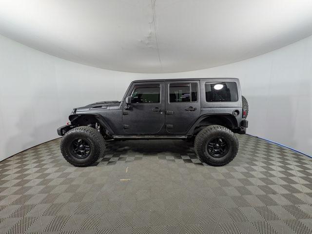 used 2015 Jeep Wrangler Unlimited car, priced at $9,192
