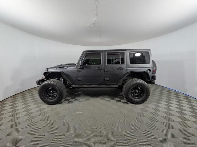 used 2015 Jeep Wrangler Unlimited car, priced at $10,093