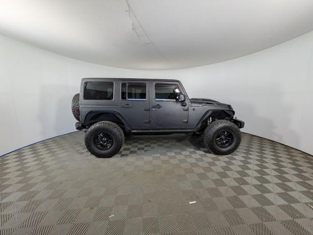 used 2015 Jeep Wrangler Unlimited car, priced at $9,192