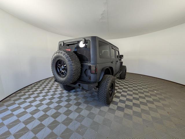 used 2015 Jeep Wrangler Unlimited car, priced at $10,093