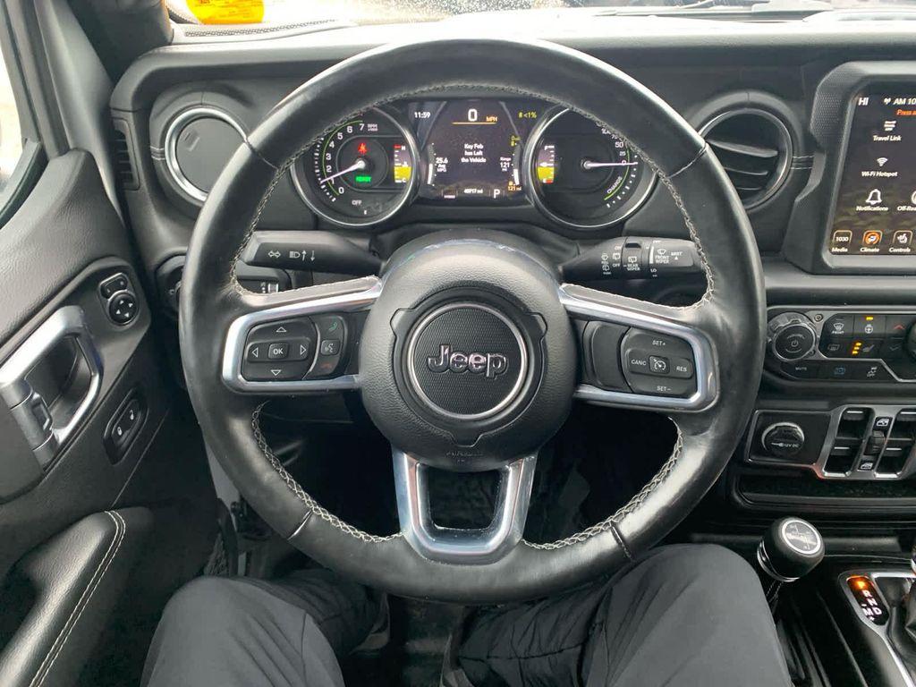 used 2023 Jeep Wrangler 4xe car, priced at $28,590