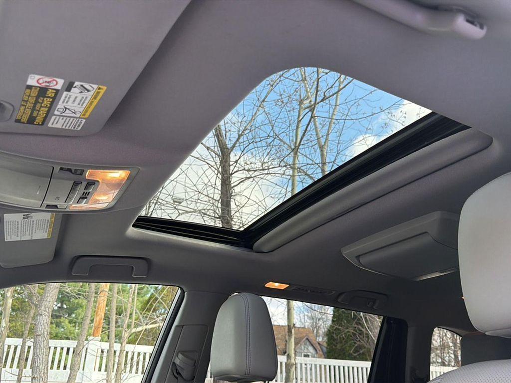 used 2015 Toyota Highlander Hybrid car, priced at $18,490