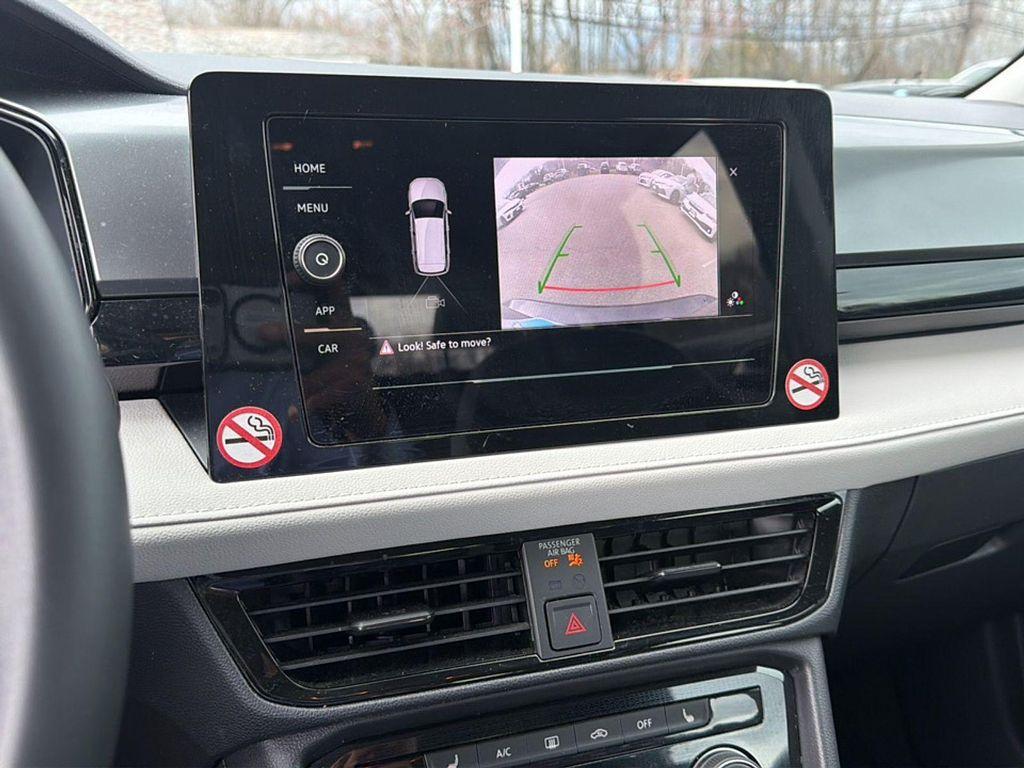 used 2025 Volkswagen Taos car, priced at $22,991