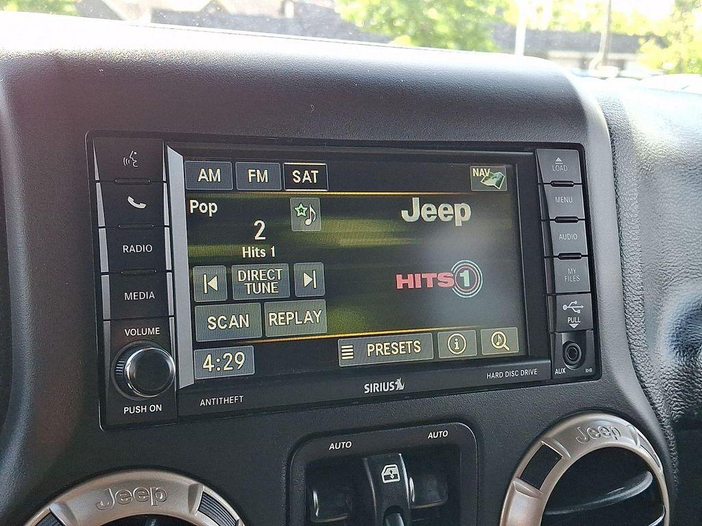 used 2016 Jeep Wrangler Unlimited car, priced at $16,491