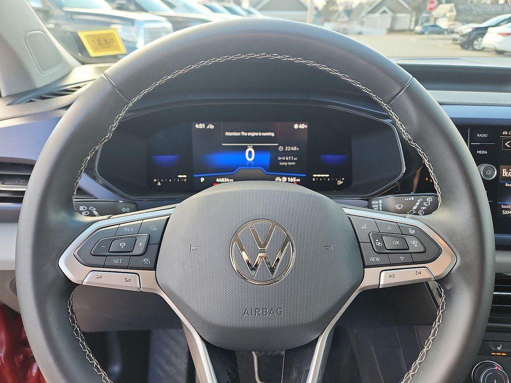 used 2022 Volkswagen Taos car, priced at $18,292