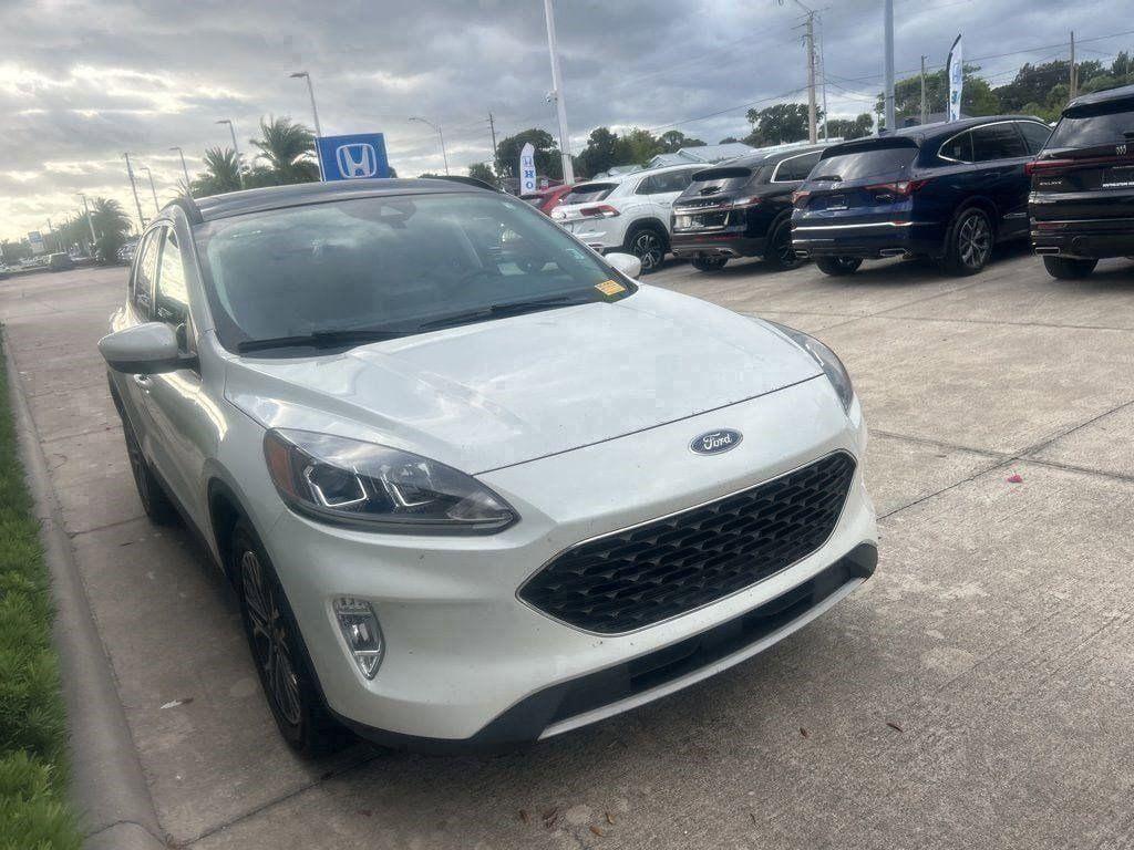 used 2021 Ford Escape car, priced at $12,900