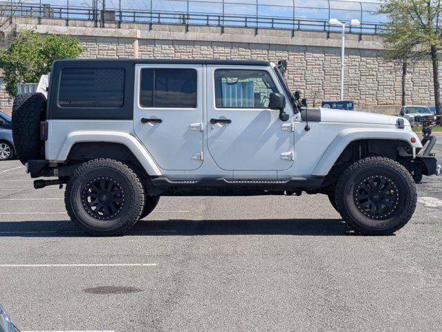 used 2015 Jeep Wrangler Unlimited car, priced at $16,668