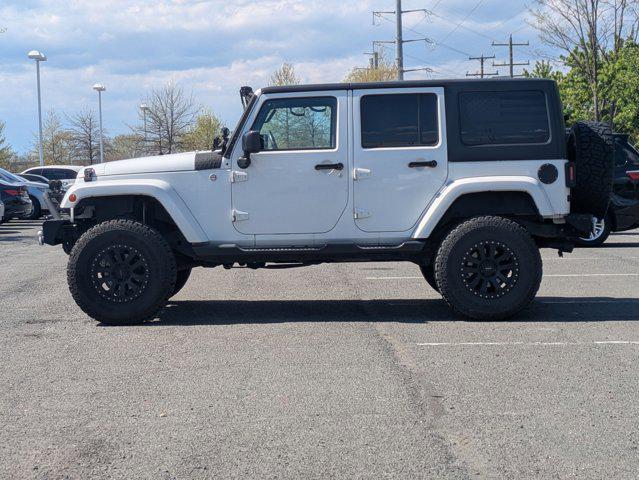 used 2015 Jeep Wrangler Unlimited car, priced at $16,668