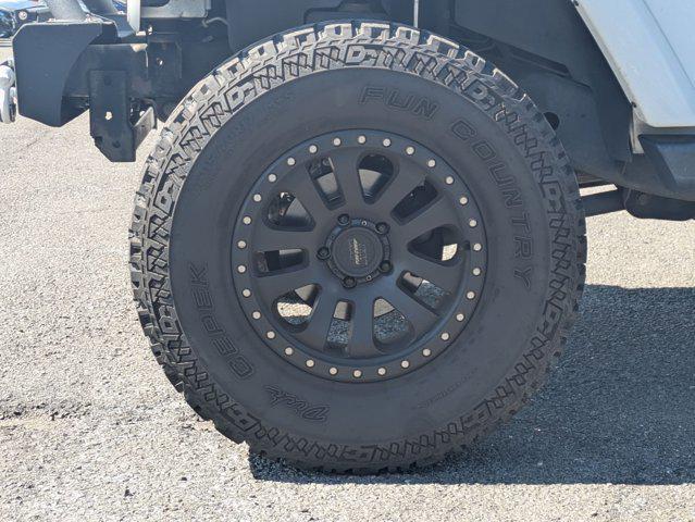 used 2015 Jeep Wrangler Unlimited car, priced at $16,668