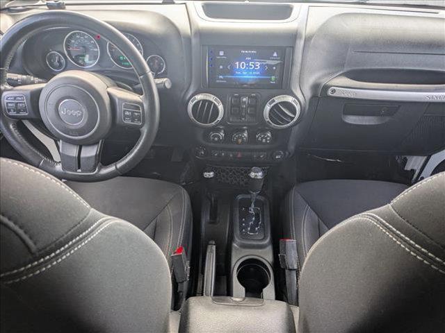 used 2015 Jeep Wrangler Unlimited car, priced at $17,666