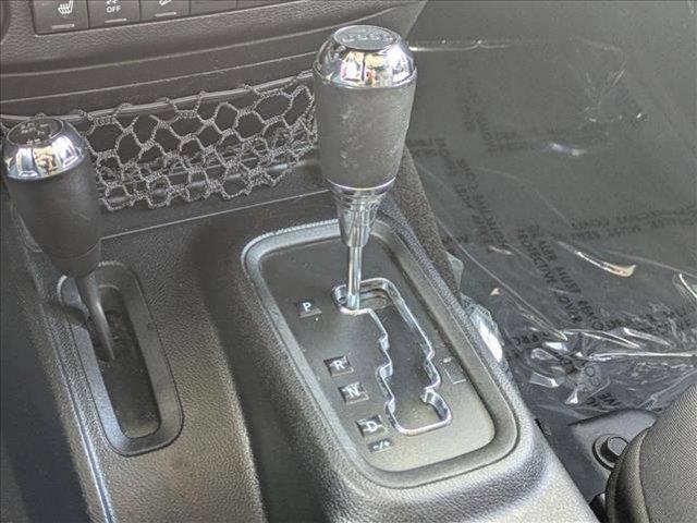 used 2015 Jeep Wrangler Unlimited car, priced at $17,666