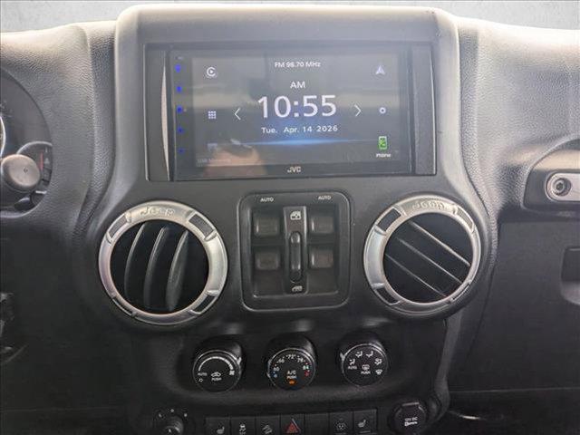 used 2015 Jeep Wrangler Unlimited car, priced at $17,666