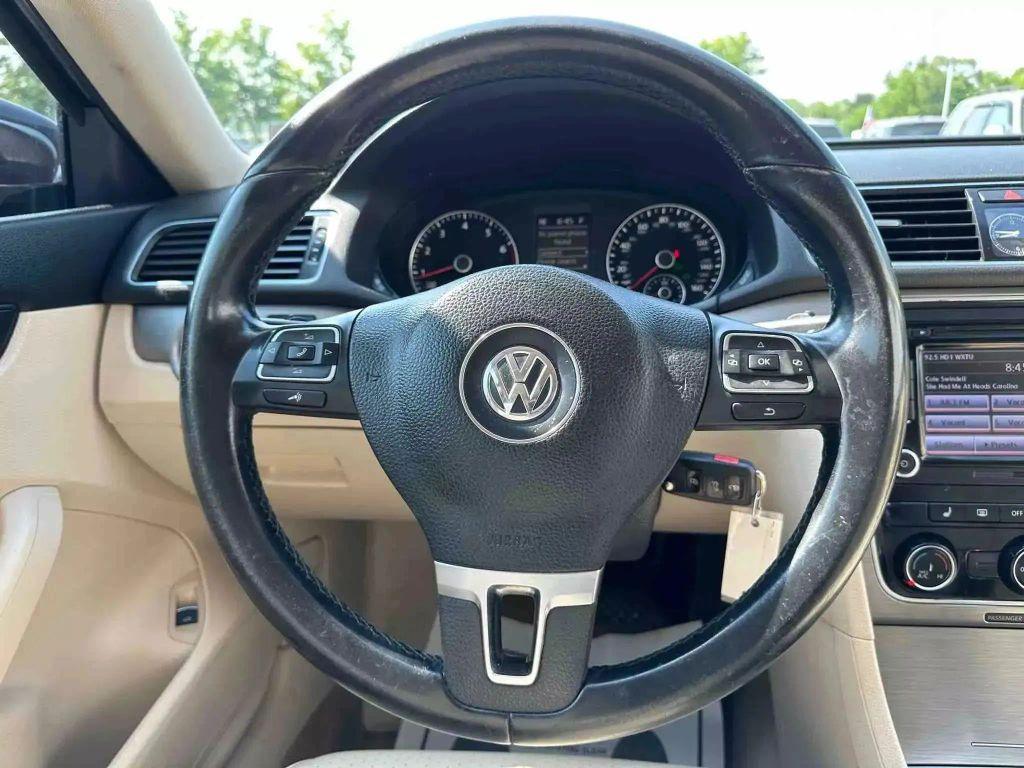 used 2014 Volkswagen Passat car, priced at $8,991