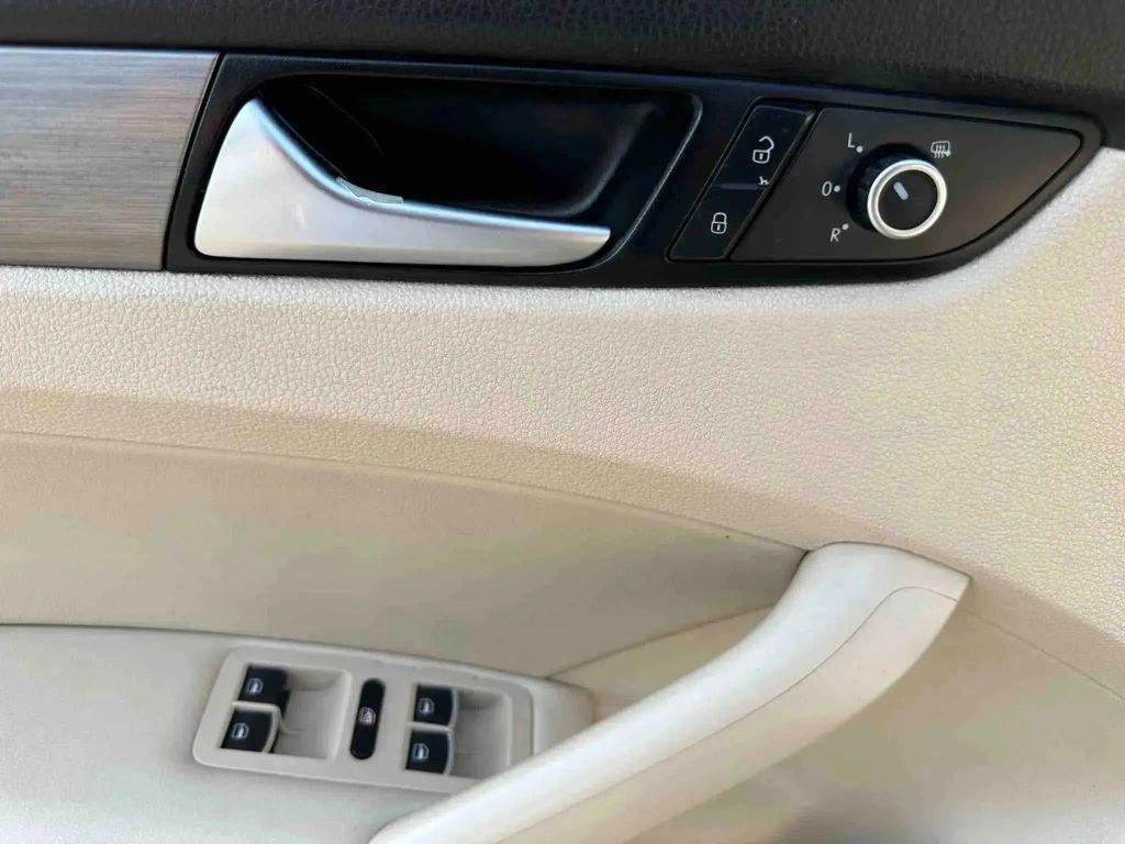 used 2014 Volkswagen Passat car, priced at $8,991