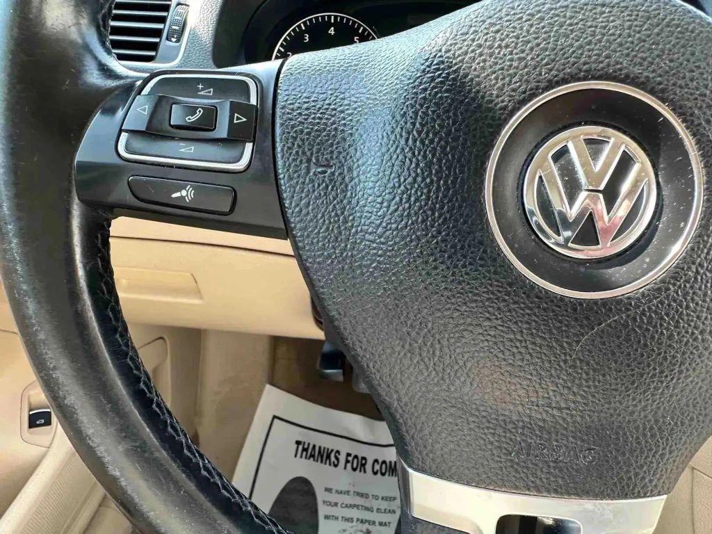 used 2014 Volkswagen Passat car, priced at $8,991