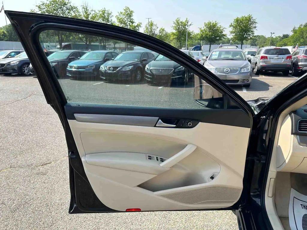 used 2014 Volkswagen Passat car, priced at $8,991