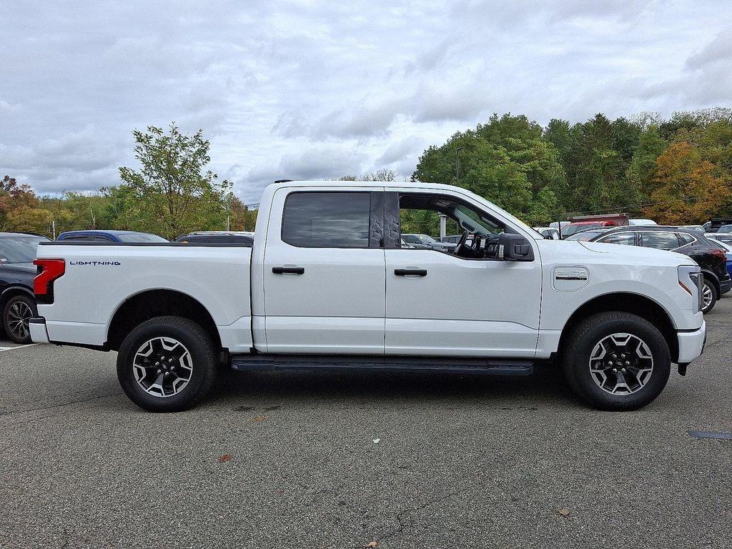 used 2023 Ford F-150 Lightning car, priced at $36,991