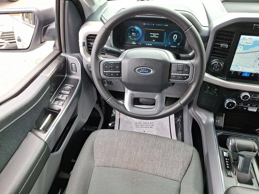 used 2023 Ford F-150 Lightning car, priced at $36,991