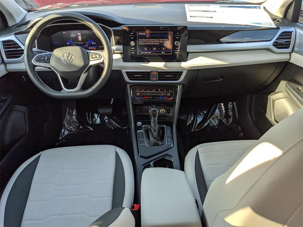 new 2025 Volkswagen Taos car, priced at $23,186