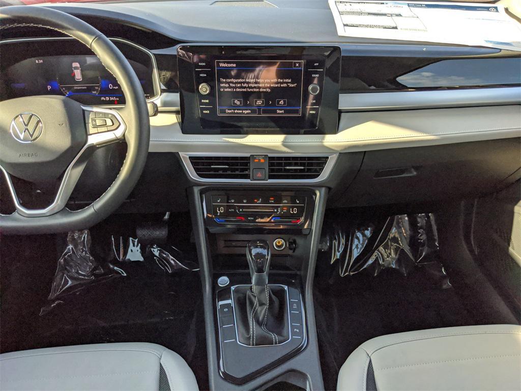 new 2025 Volkswagen Taos car, priced at $23,186