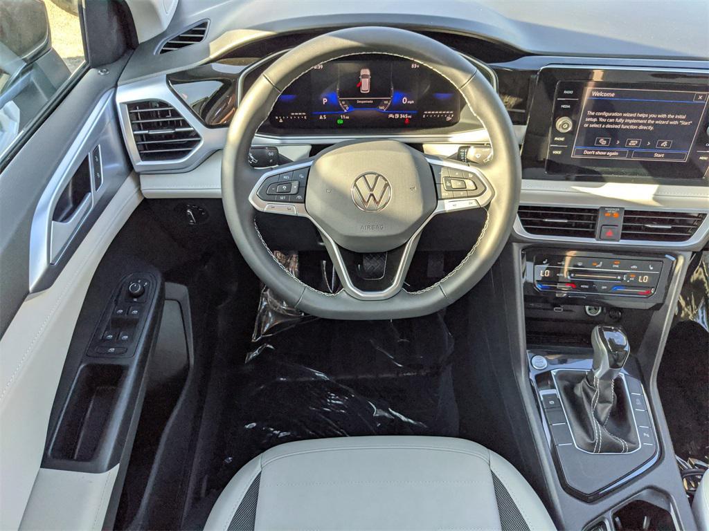 new 2025 Volkswagen Taos car, priced at $23,186