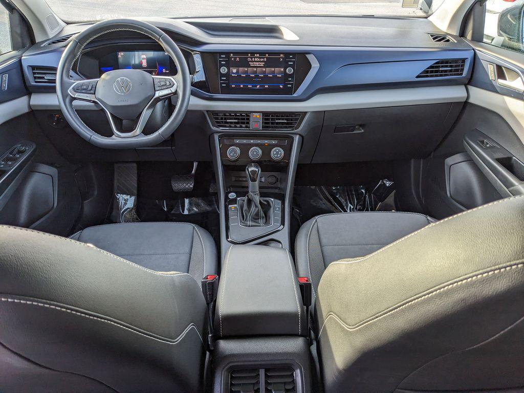 used 2023 Volkswagen Taos car, priced at $18,057