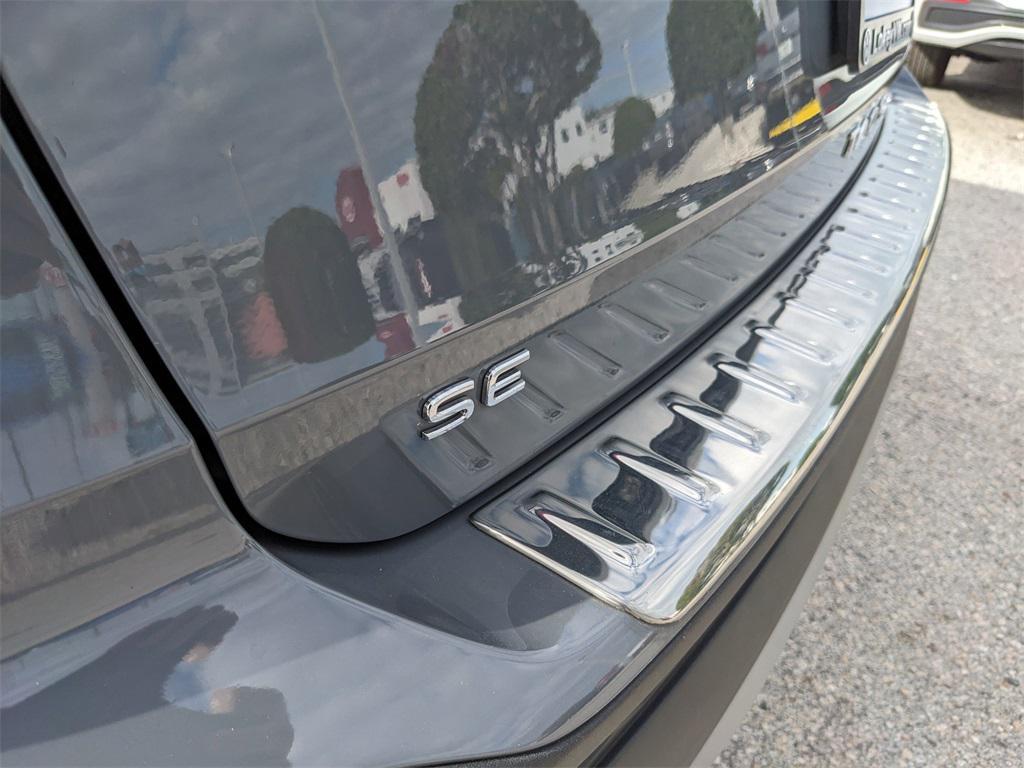 used 2023 Volkswagen Taos car, priced at $17,604