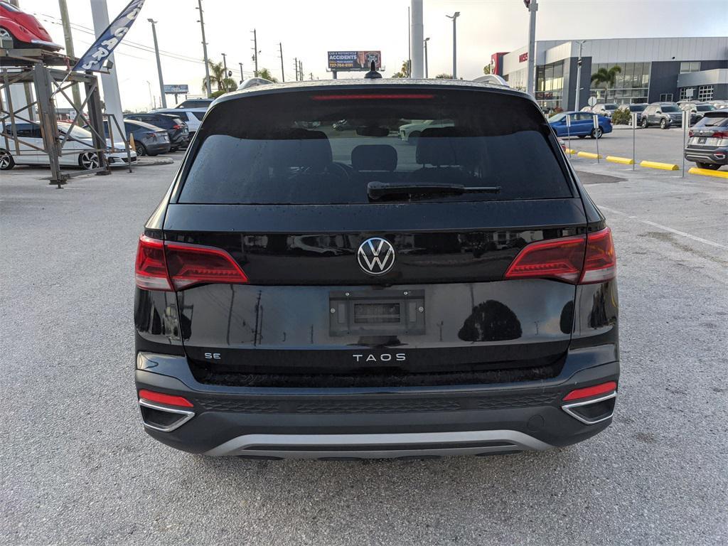 used 2023 Volkswagen Taos car, priced at $17,810