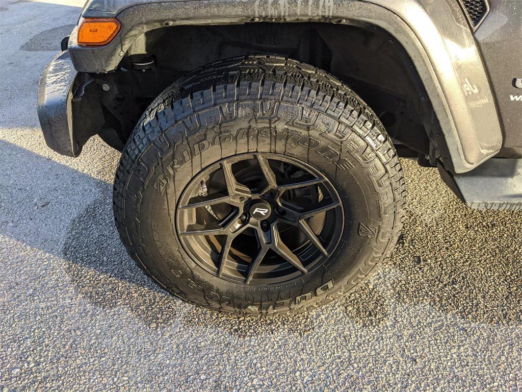 used 2021 Jeep Wrangler Unlimited car, priced at $23,057