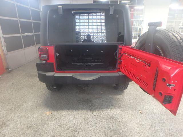 used 2015 Jeep Wrangler Unlimited car, priced at $15,495