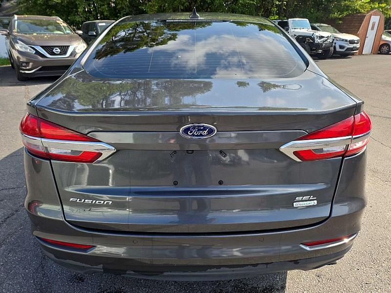 used 2020 Ford Fusion car, priced at $14,300