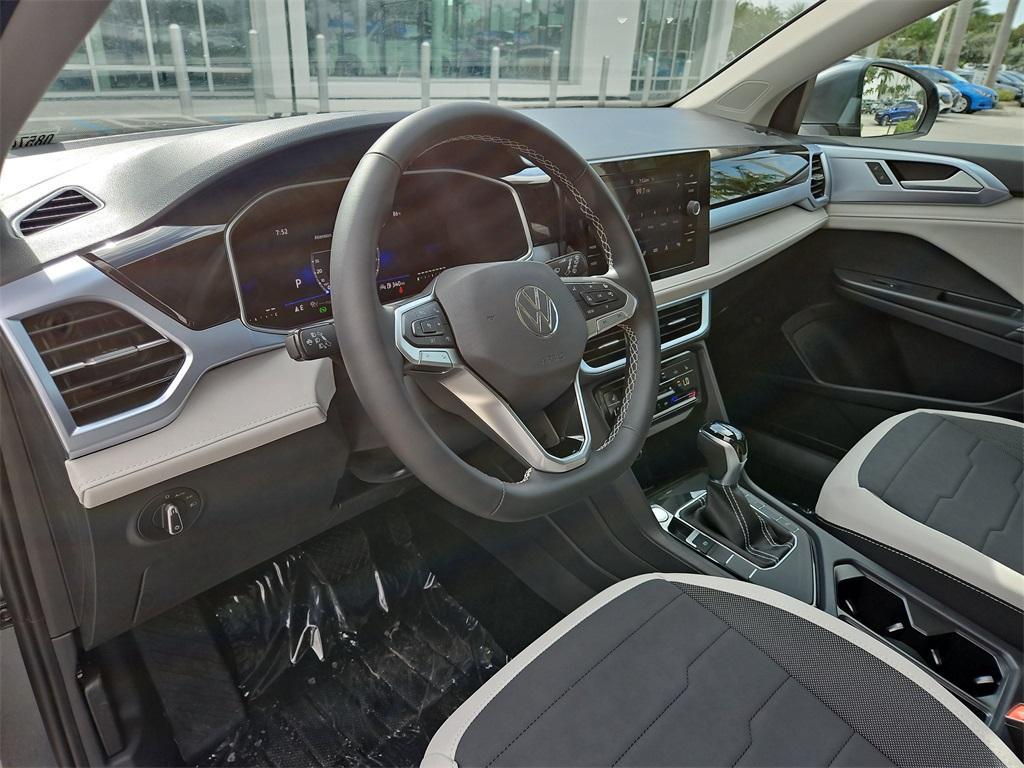 new 2025 Volkswagen Taos car, priced at $27,096