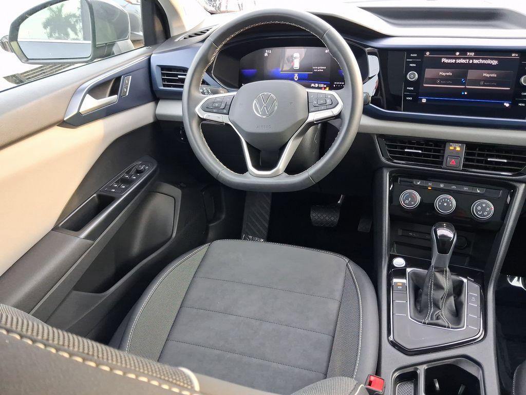 used 2023 Volkswagen Taos car, priced at $17,299