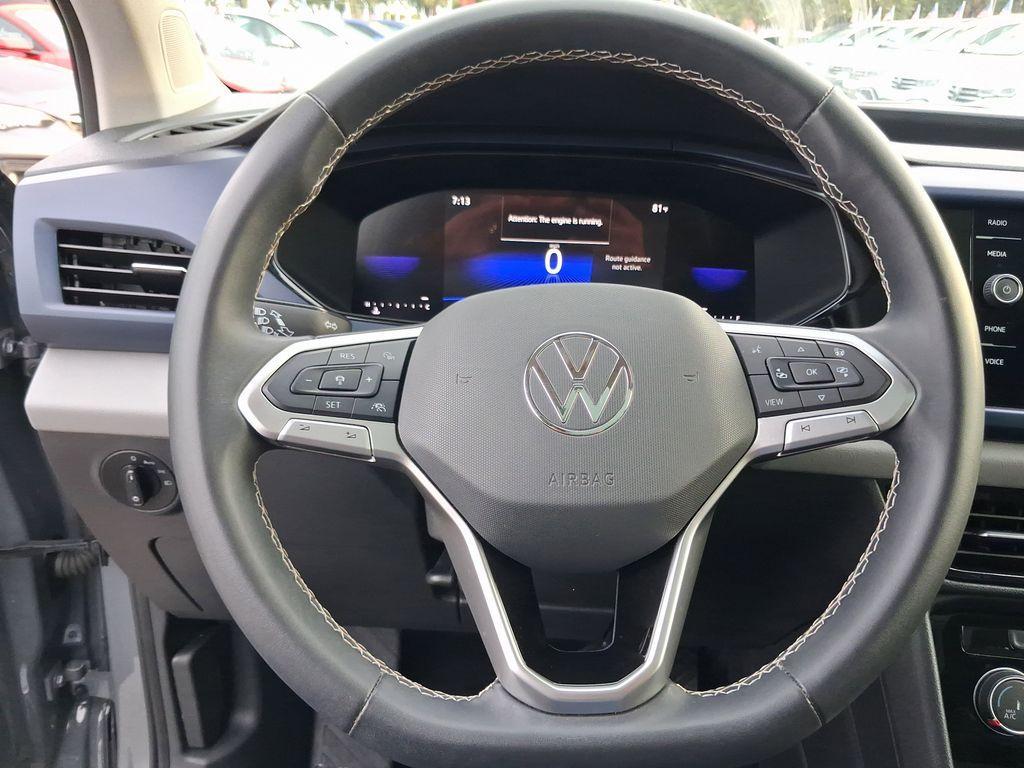 used 2023 Volkswagen Taos car, priced at $17,299