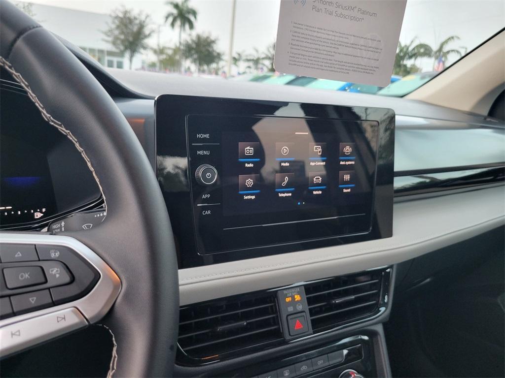 used 2025 Volkswagen Taos car, priced at $20,079