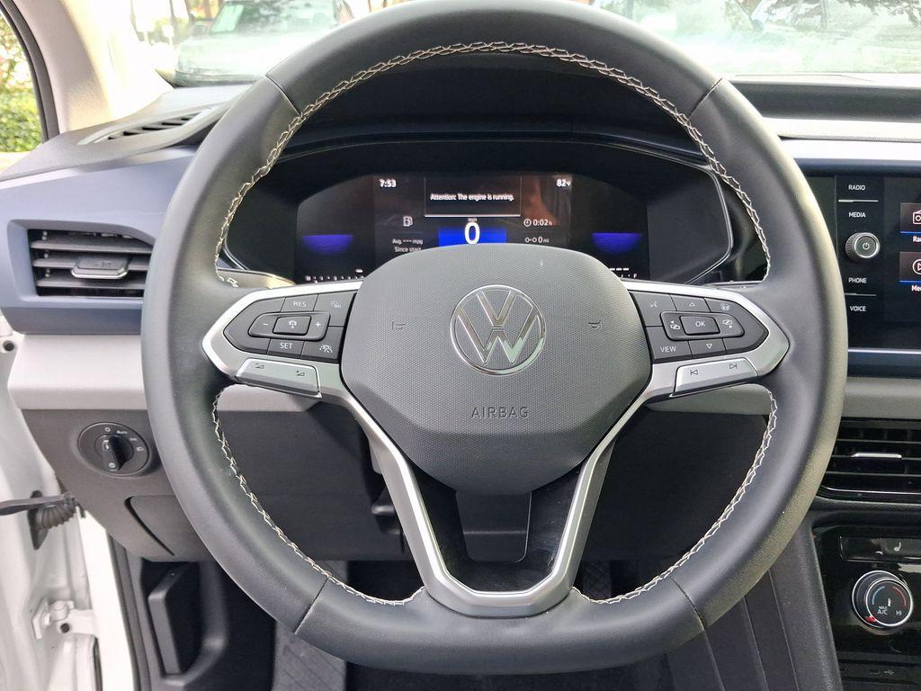 used 2023 Volkswagen Taos car, priced at $18,199