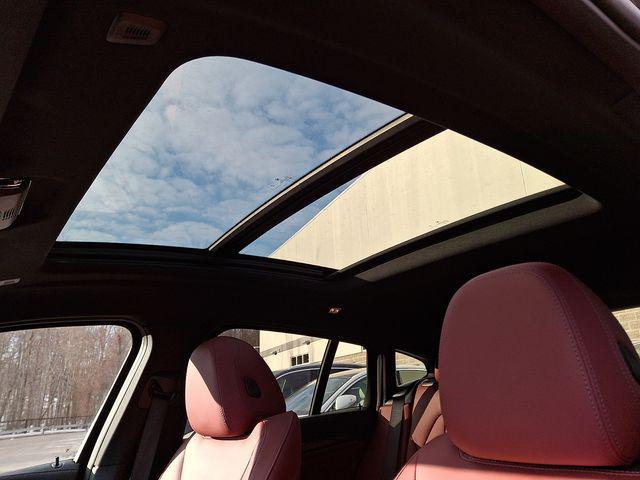 used 2025 BMW X4 car, priced at $52,995