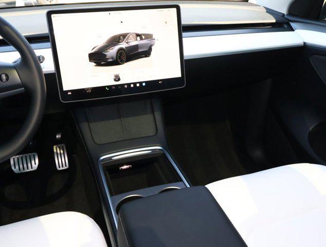 used 2025 Tesla Model Y car, priced at $42,955