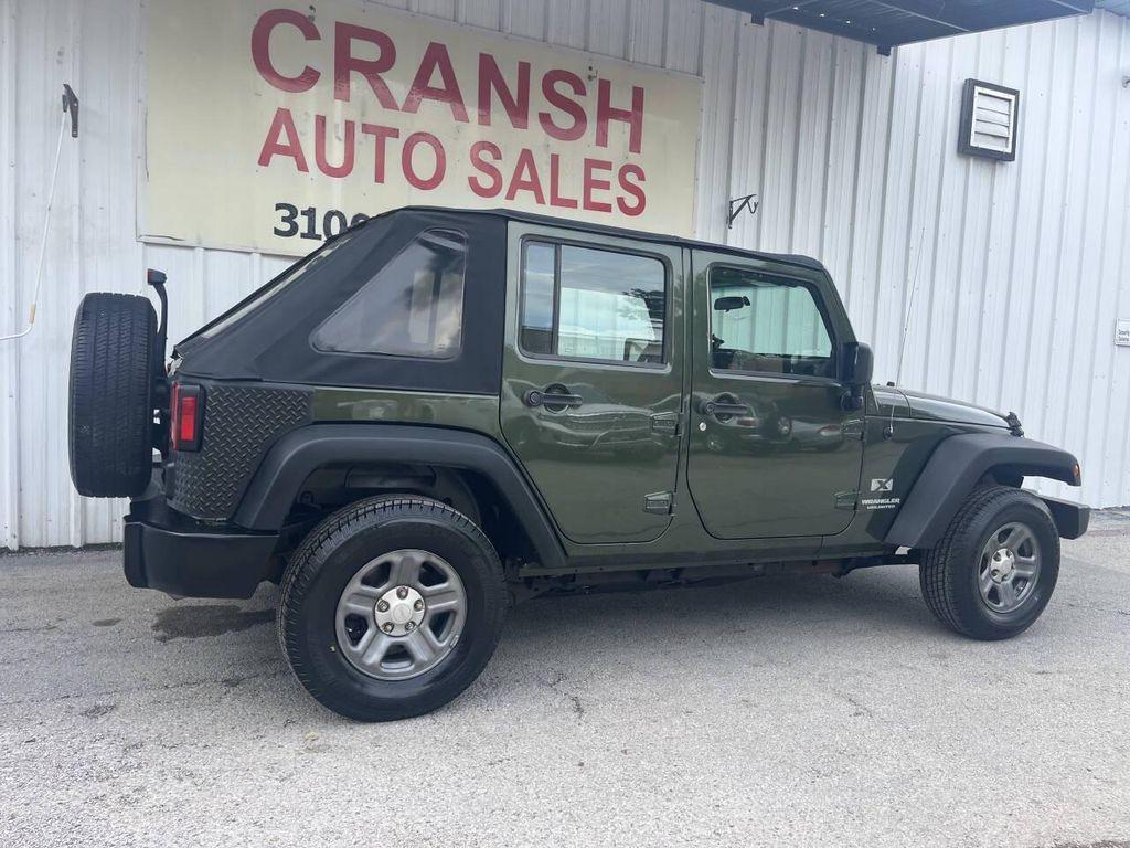 used 2009 Jeep Wrangler Unlimited car, priced at $9,875